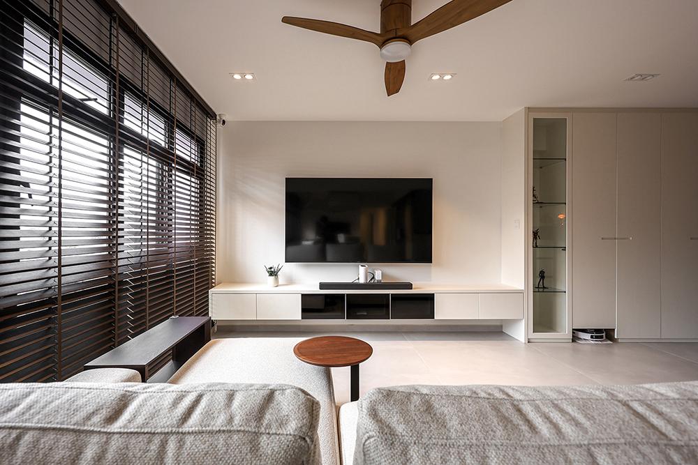 Minimalist Living Room with Homogeneous Tiles and TV Console