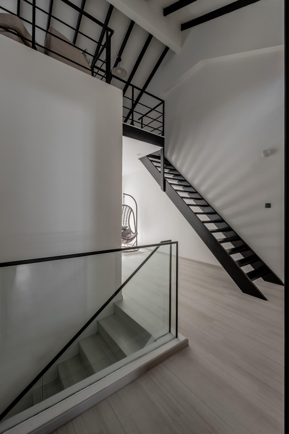 Modern Living Room with Staircase and Panelling