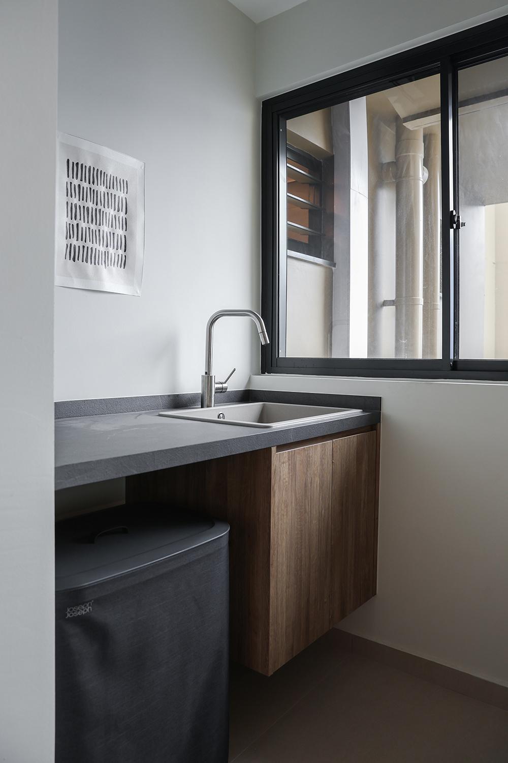 Minimalist Service Yard with Vanity Counter and Laundry Baskets
