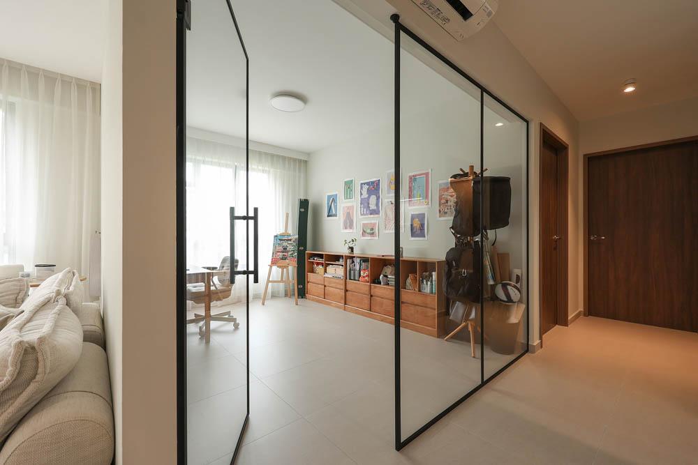 Minimalist Study with Bookshelf and Homogeneous Tiles