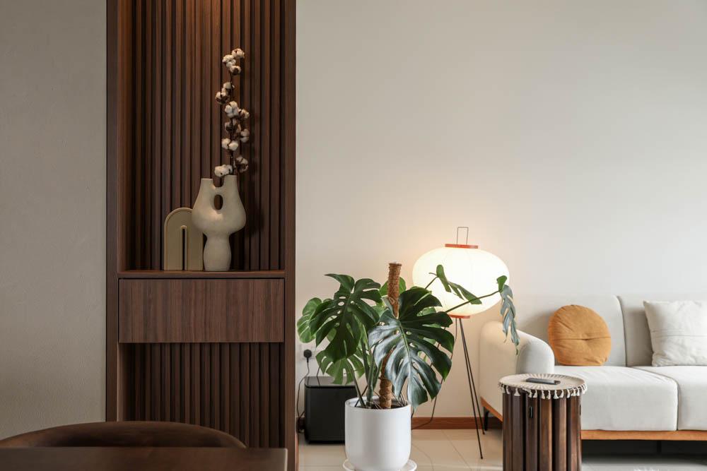 Modern Living Room with Homogeneous Tiles and Display Cabinets
