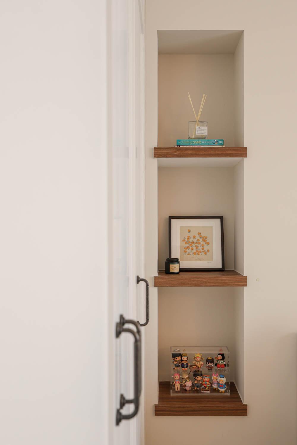 Modern Bedroom with Paintings and Display Cabinets