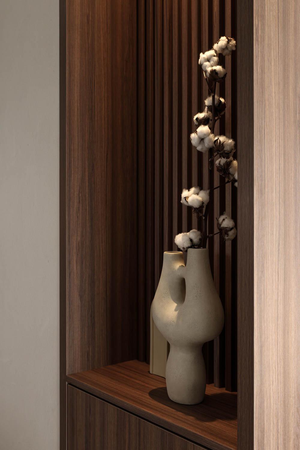 Modern Foyer with Artwork and Display Cabinets