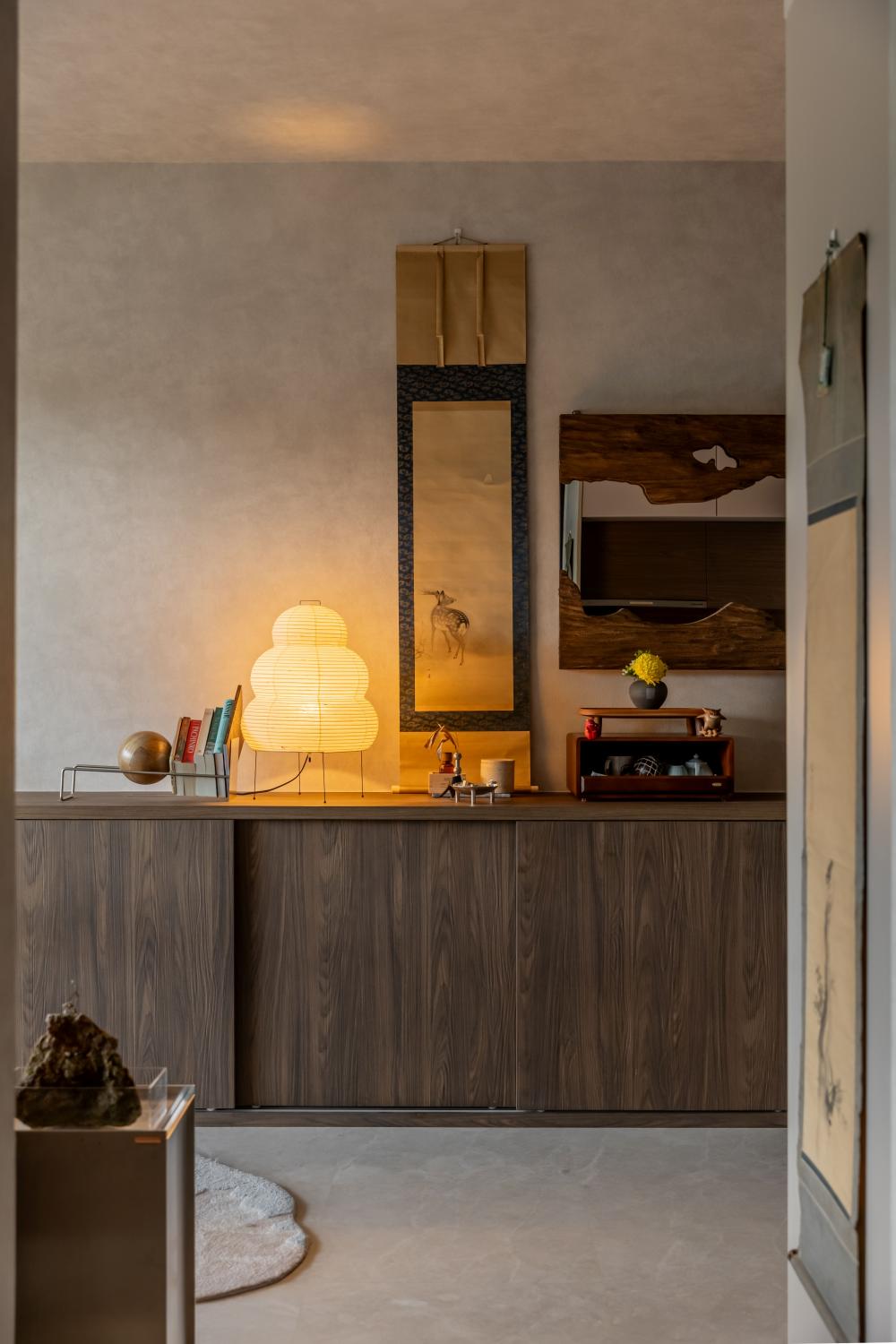 Modern Living Room with Paintings and Display Cabinets
