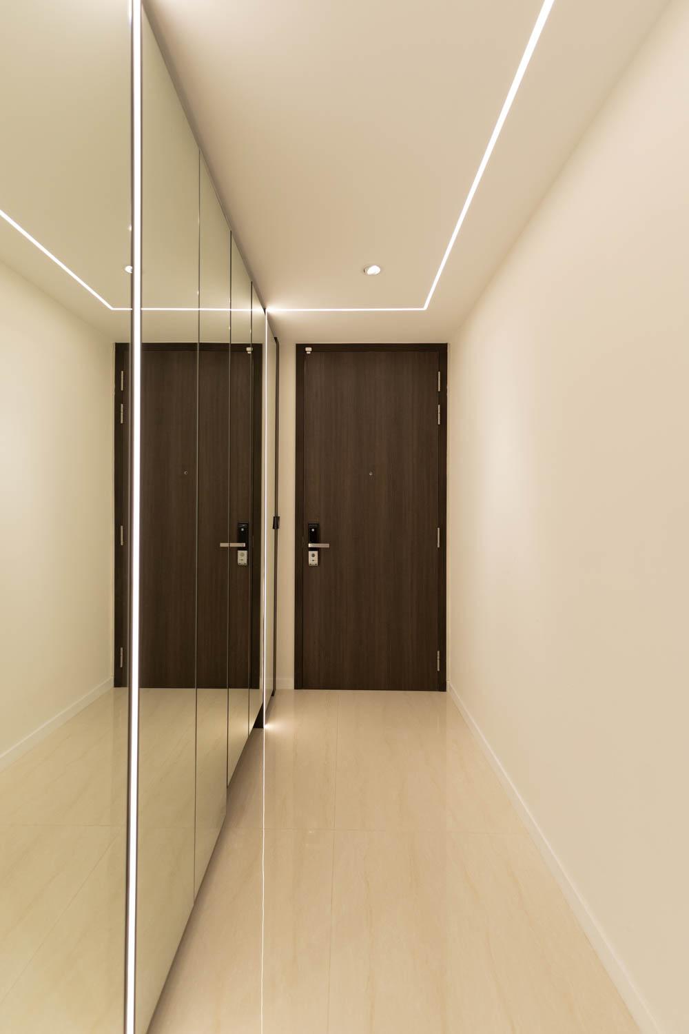 Modern Foyer with Mirror and Lighting