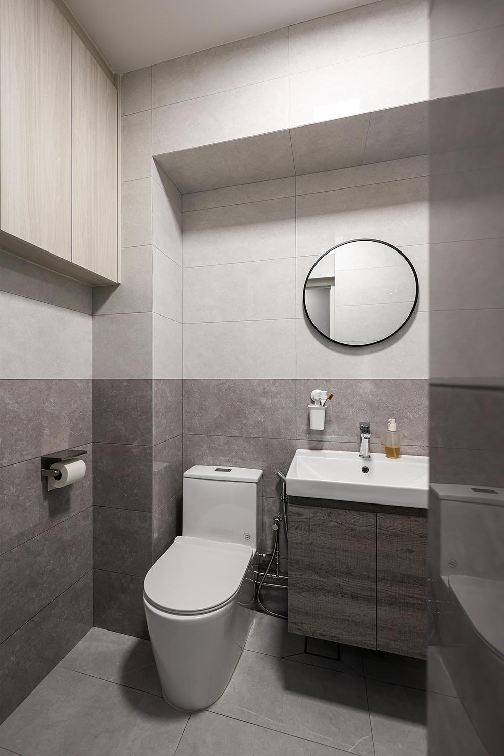 Scandinavian Bathroom with Homogeneous Tiles and Bathroom Storage