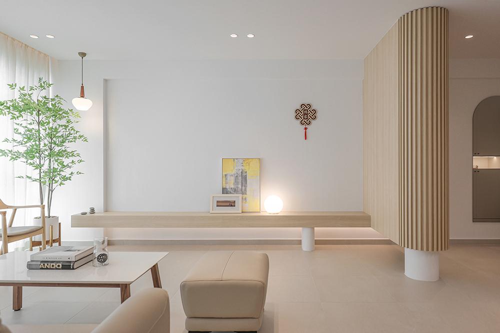 Minimalist Living Room with Homogeneous Tiles and TV Console
