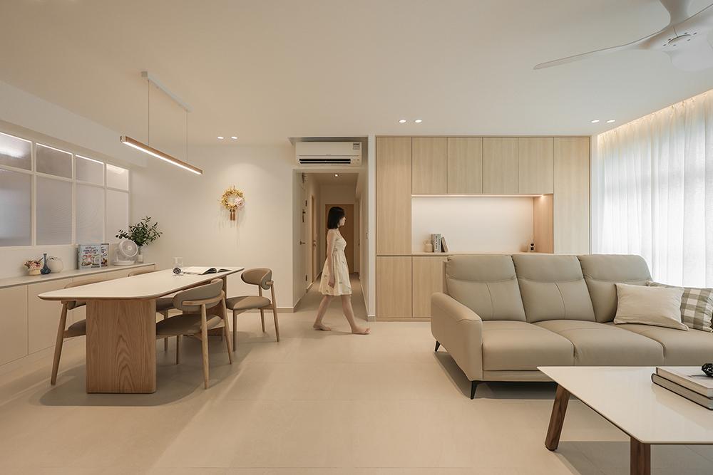 Minimalist Living Room with Homogeneous Tiles and Dining Table