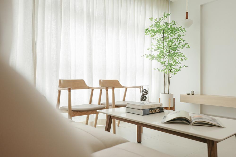 Minimalist Living Room with Homogeneous Tiles and TV Console