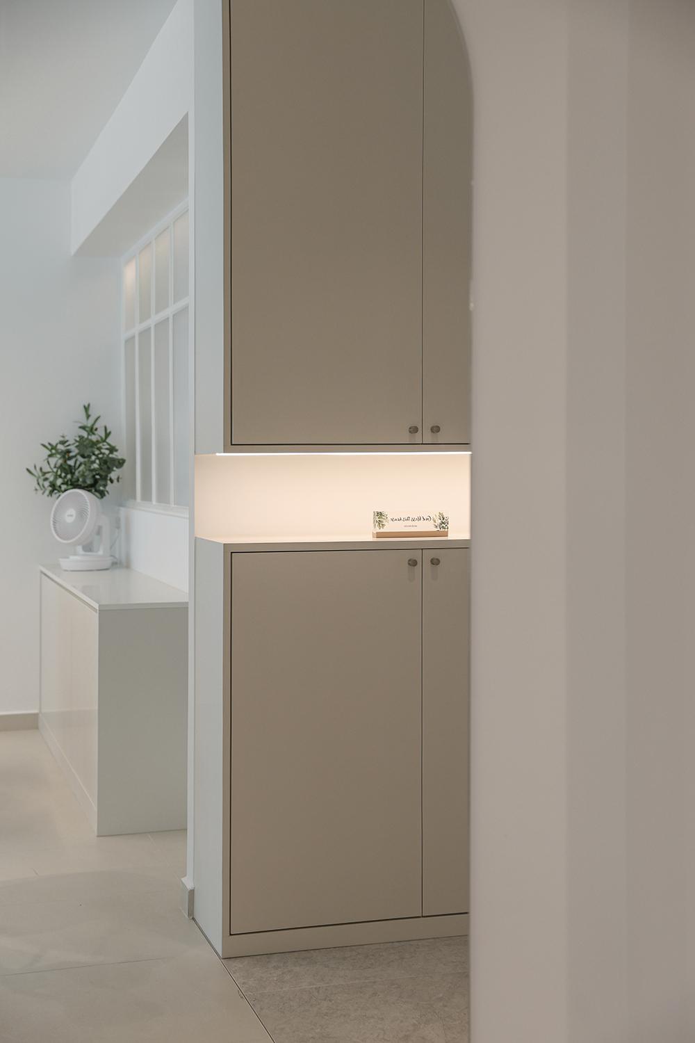Minimalist Foyer with Storage Cabinets and Lighting