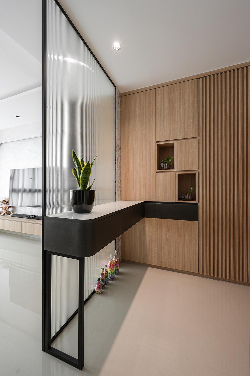 Scandinavian Foyer with Storage Cabinets and Houseplants