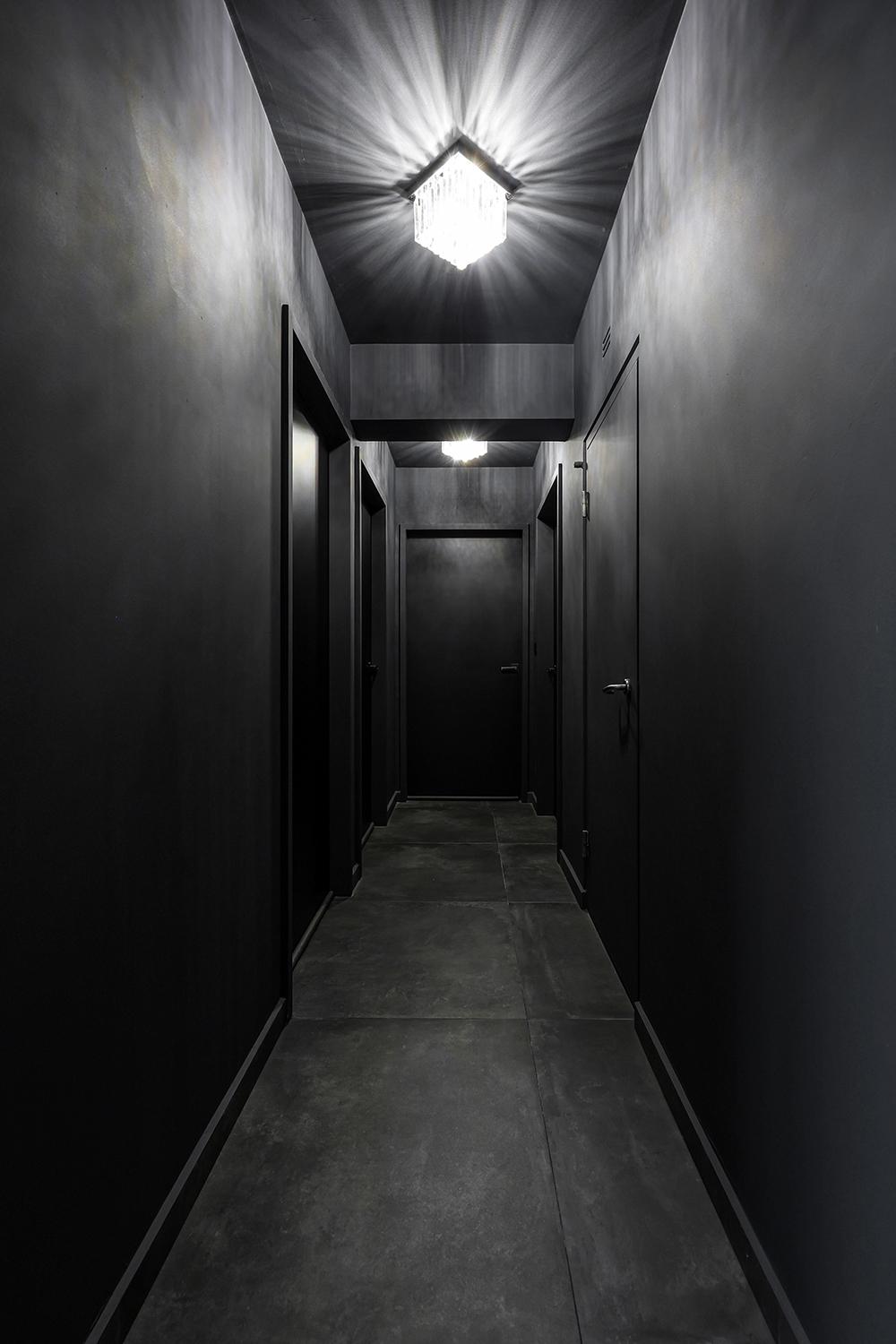 Modern Hallway with Paintings and Lighting