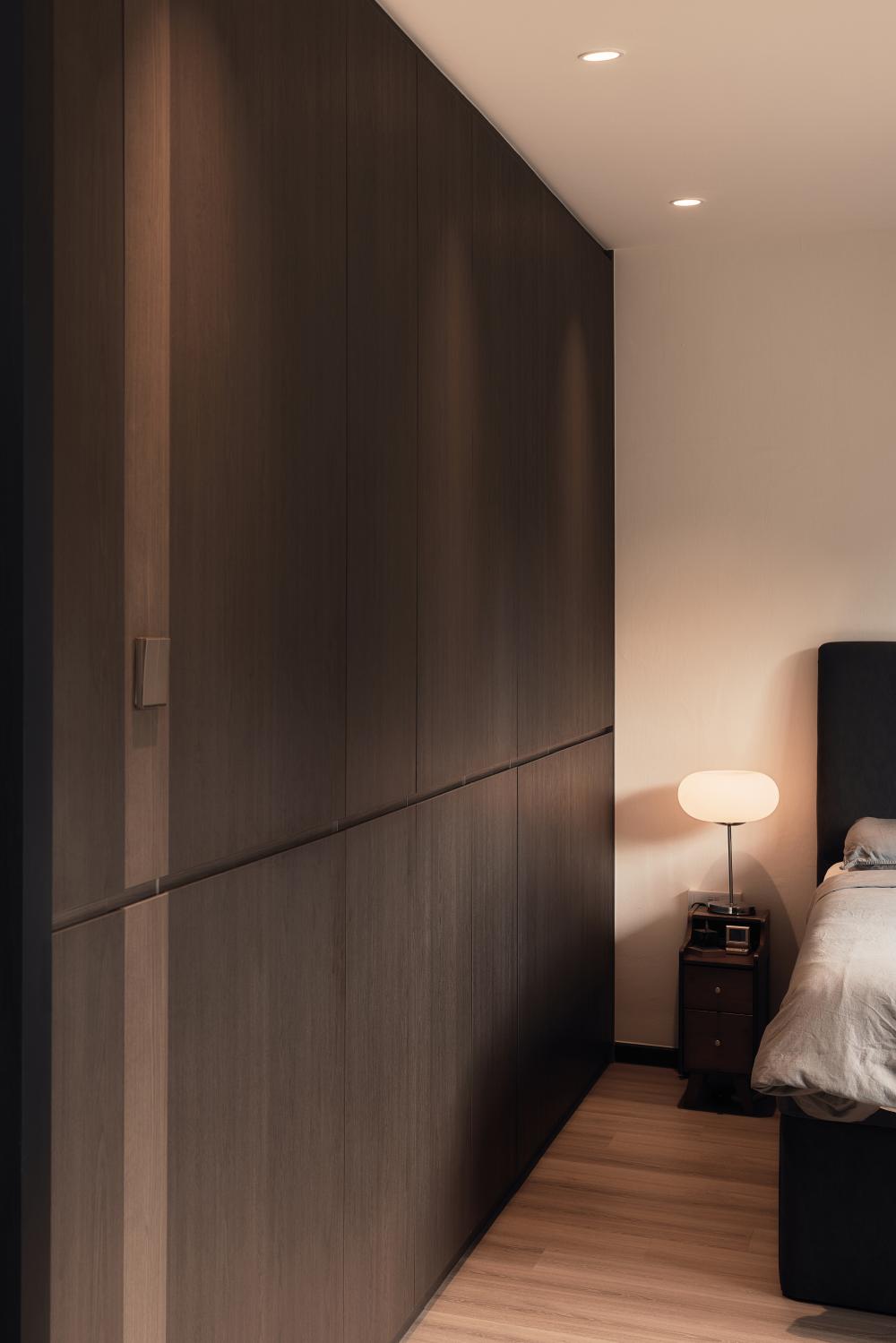 Contemporary Bedroom with Wood Flooring and Feature Wall