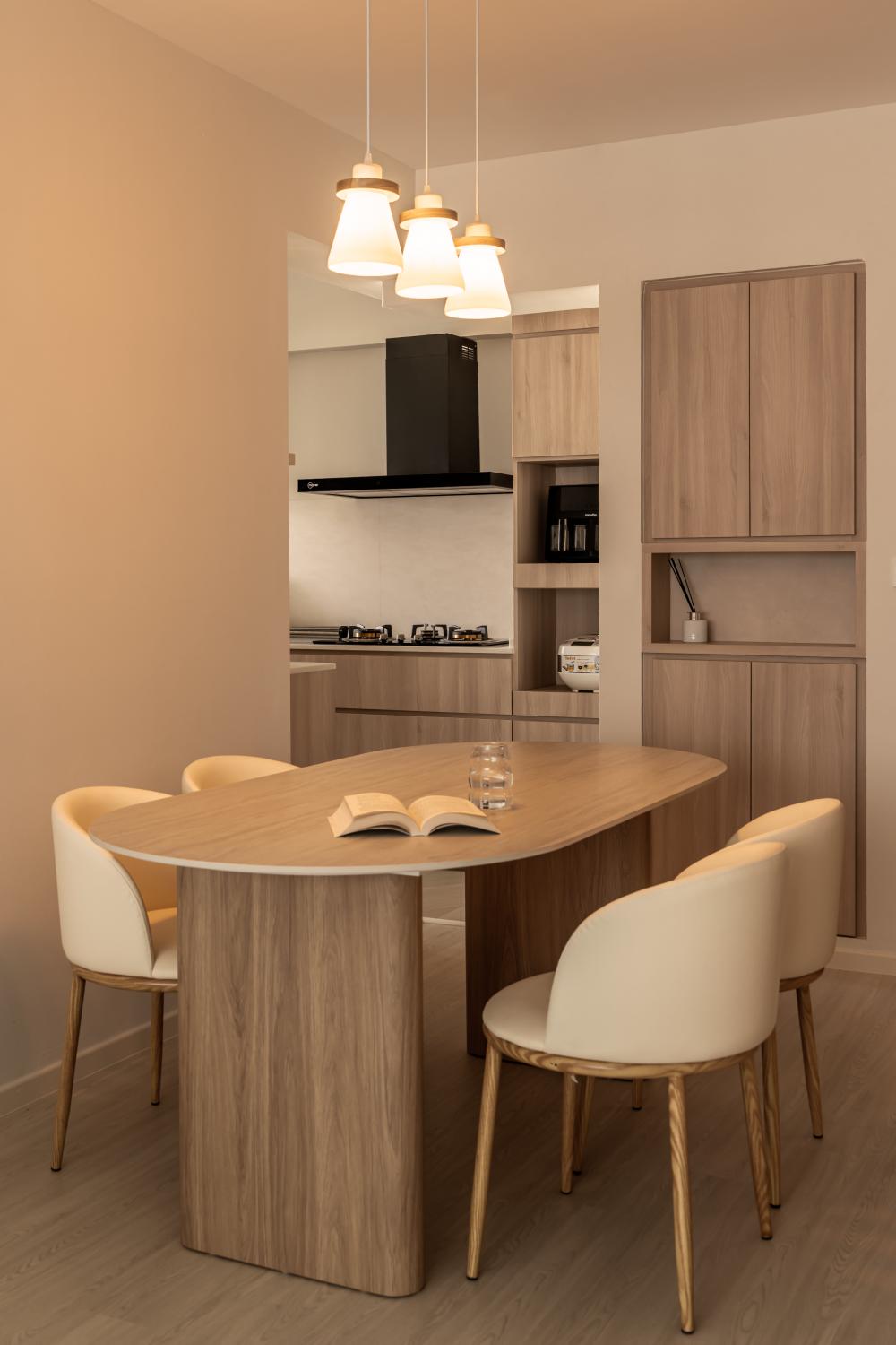 Scandinavian Dining Room with Wood Flooring and Dining Table
