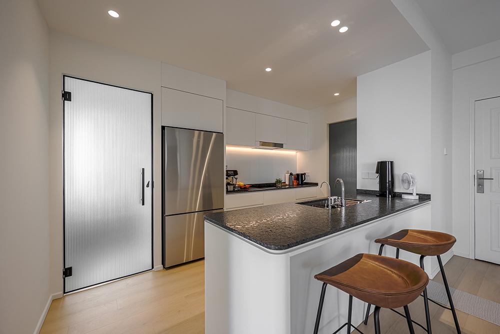Country Kitchen with Countertop and Glass Door
