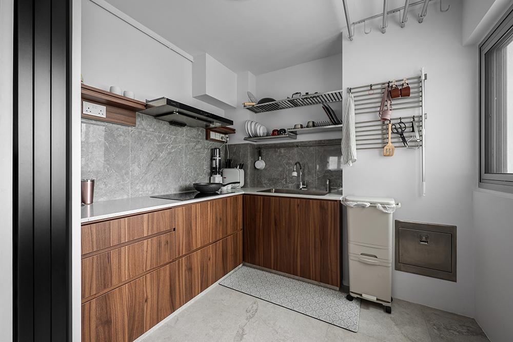 Industrial Kitchen with Homogeneous Tiles and Kitchen Cabinets