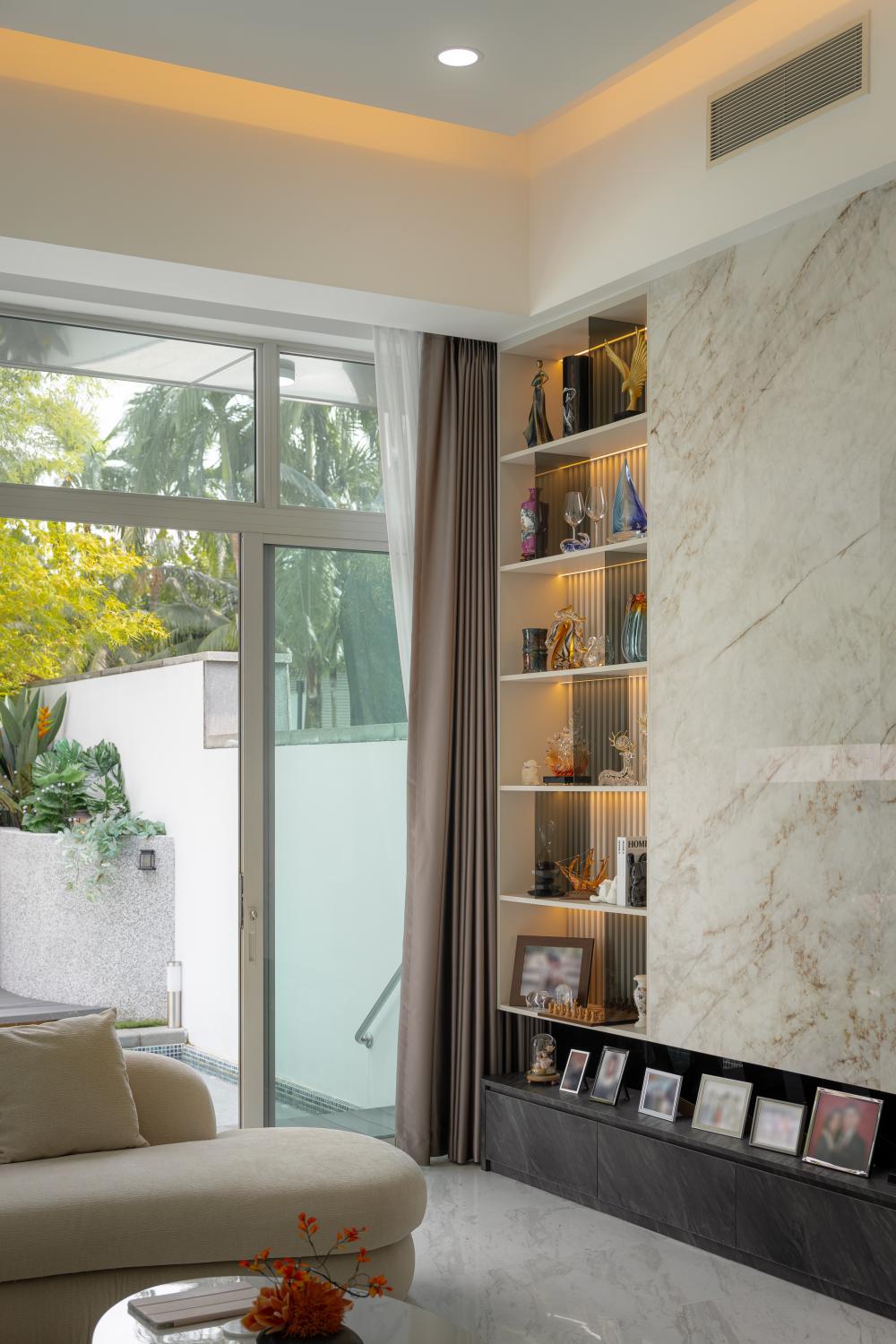 Contemporary Living Room with Bookshelf and Feature Wall