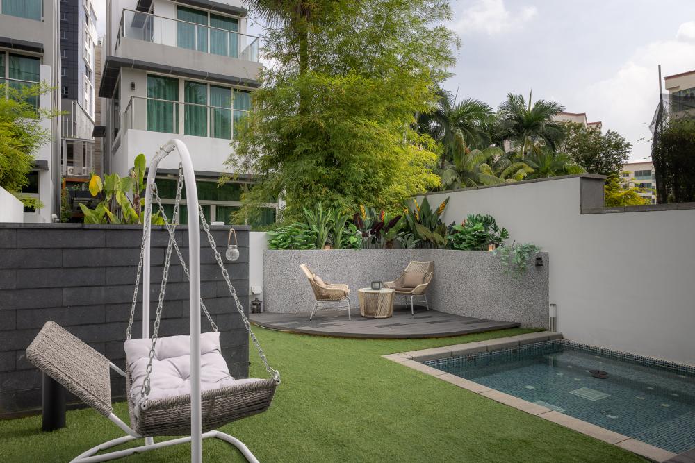 Contemporary Garden with Green Wall and Flower Pots