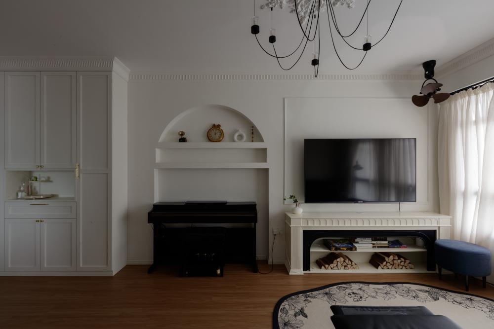 Contemporary Living Room with Homogeneous Tiles and Feature Wall