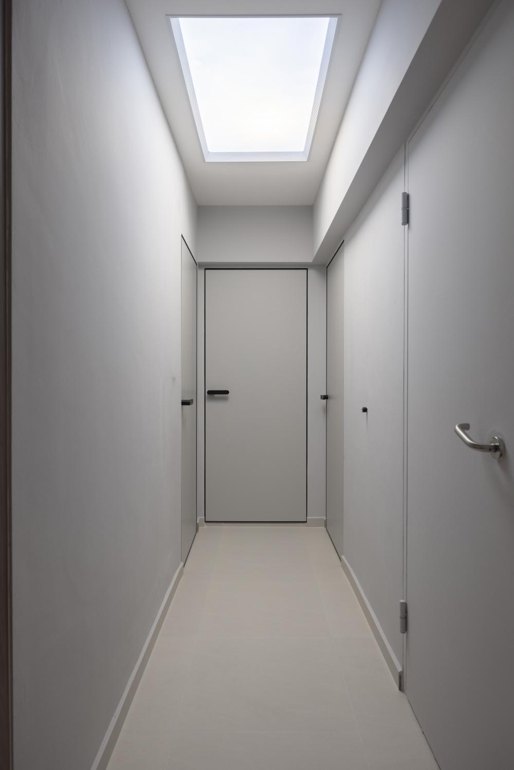 Contemporary Hallway with Paintings and Flooring