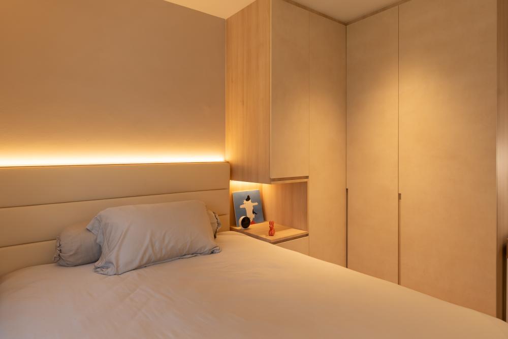Contemporary Bedroom with Herringbone Tiling and Cement Floor