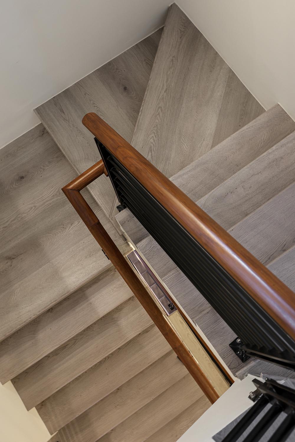 Asian Entryway with Vinyl Flooring and Staircase