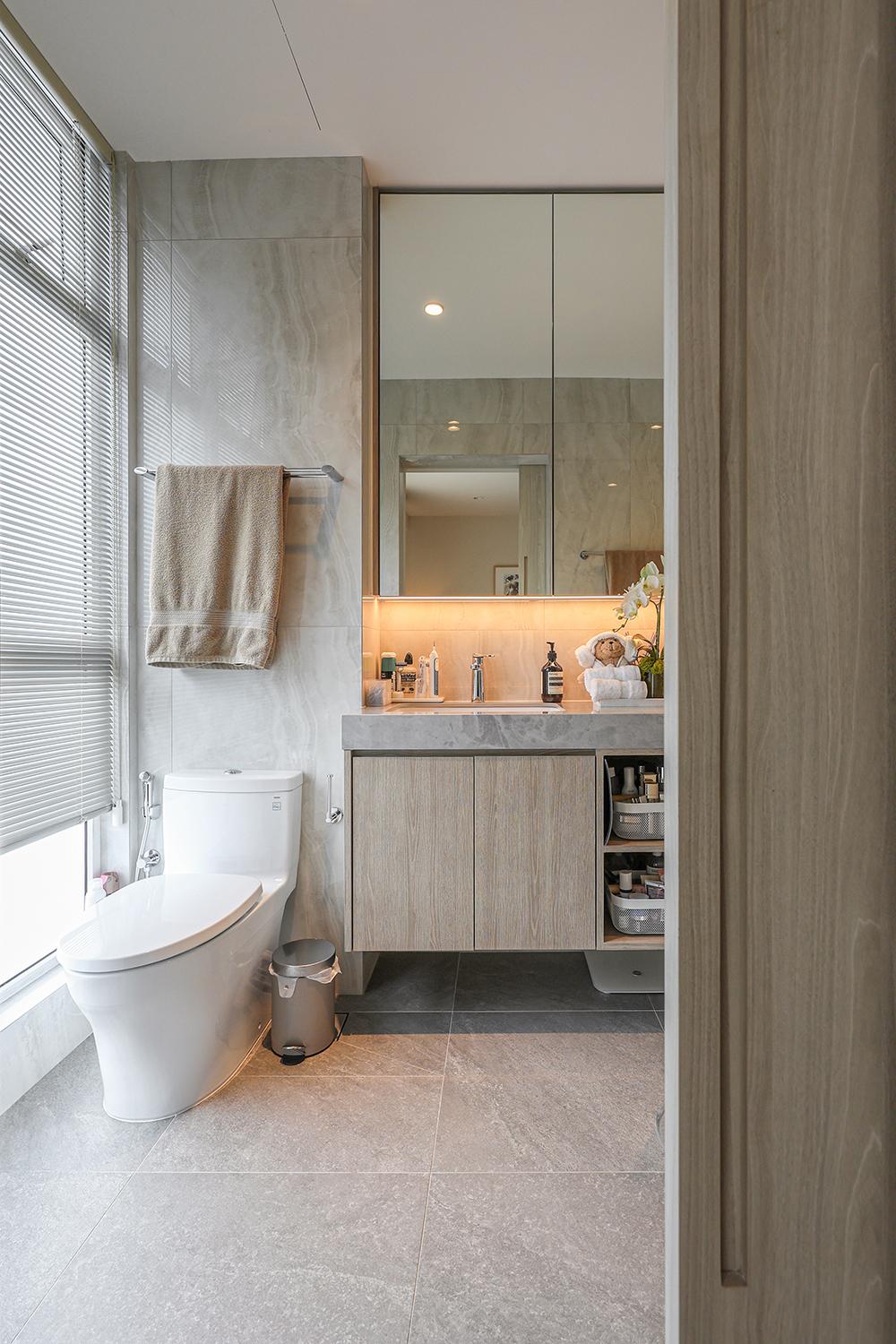 Asian Bathroom with Homogeneous Tiles and Mirror