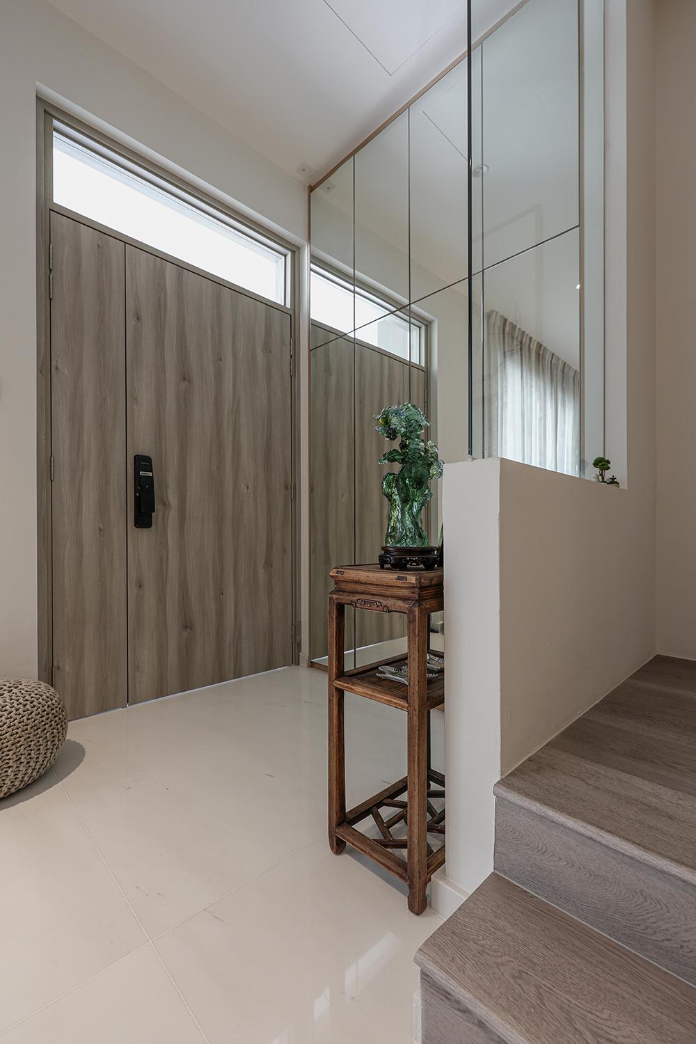 Asian Entryway with Mirror and Storage Cabinets