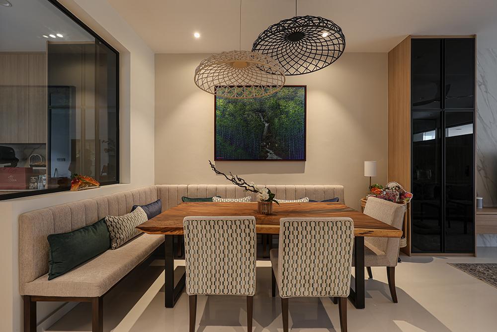 Asian Dining Room with Artwork and Storage Cabinets