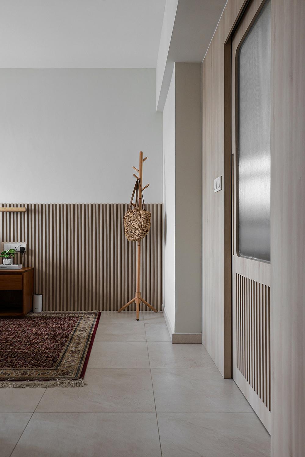 Scandinavian Bedroom with Homogeneous Tiles and Feature Wall