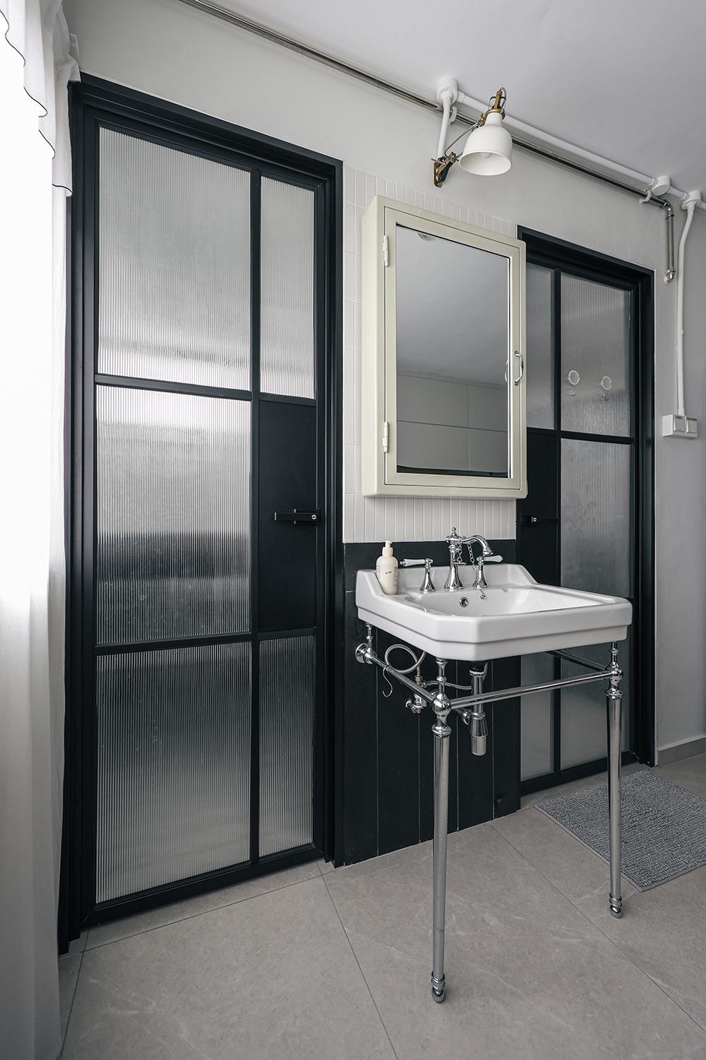 Vintage Bathroom with Homogeneous Tiles and Glass Door