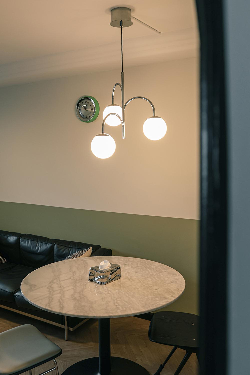 Vintage Dining Room with Vinyl Flooring and Paintings