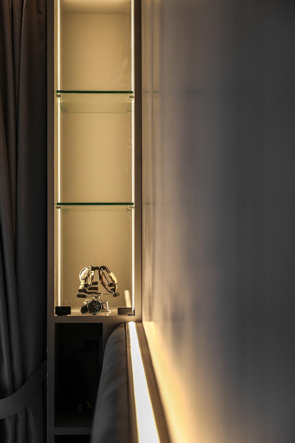 Modern Bedroom with Display Cabinets and Lighting
