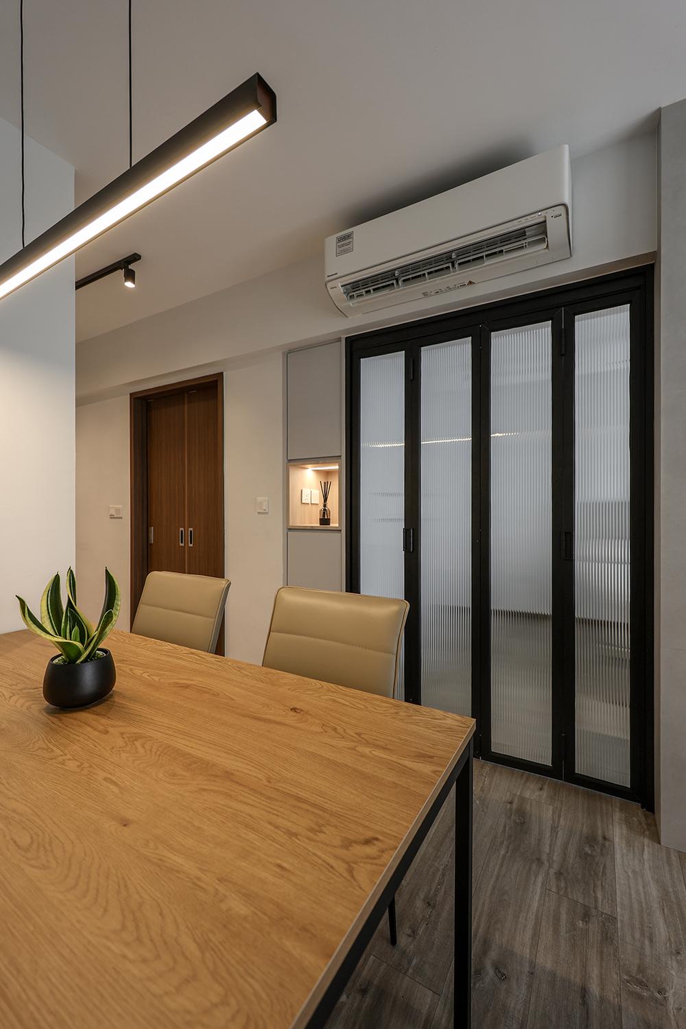 Modern Dining Room with Vinyl Flooring and Glass Door