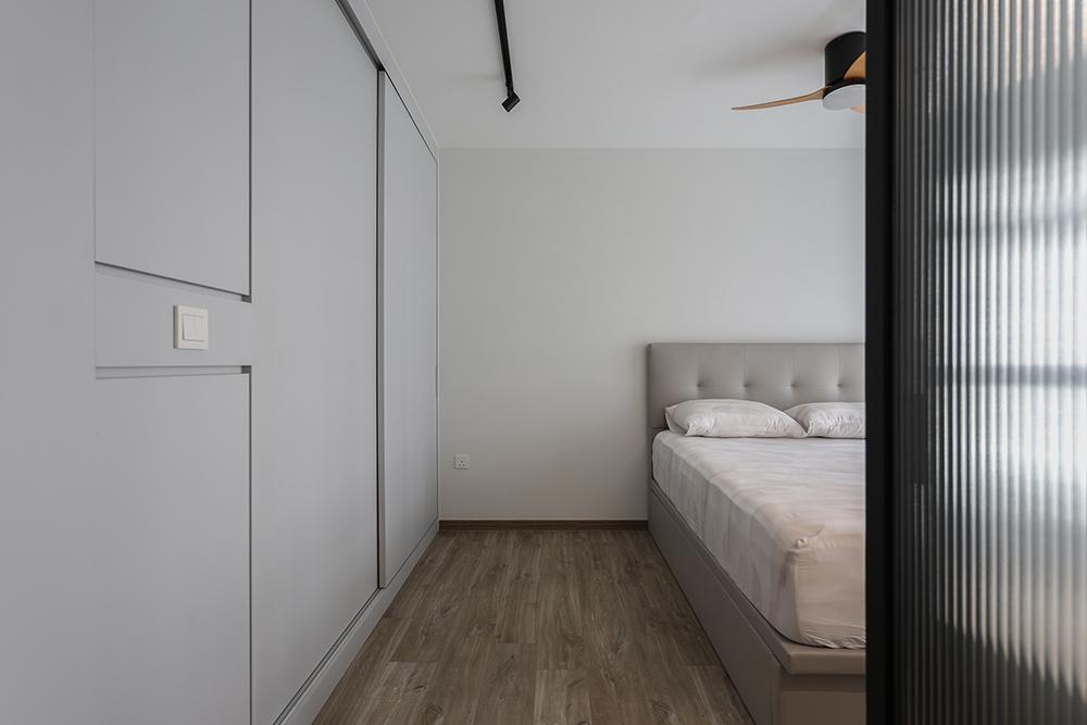 Modern Bedroom with Vinyl Flooring and Glass Door