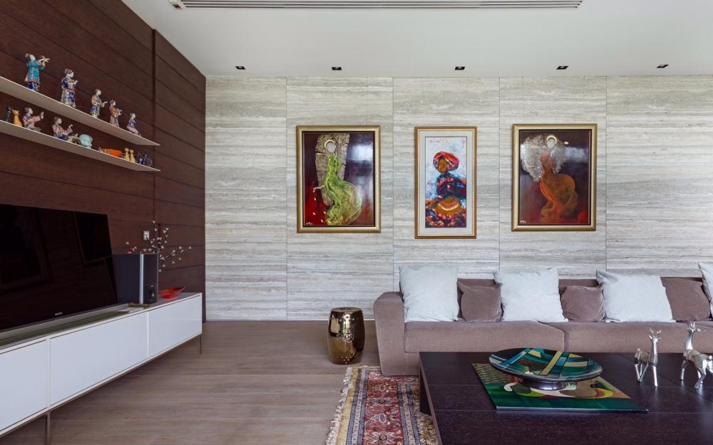 Contemporary Hallway with Bookshelf and Artwork