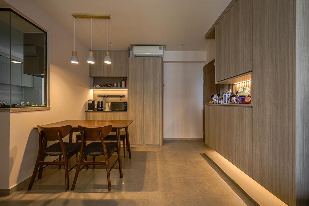 Scandinavian Dining Room with Storage Cabinets and Lighting
