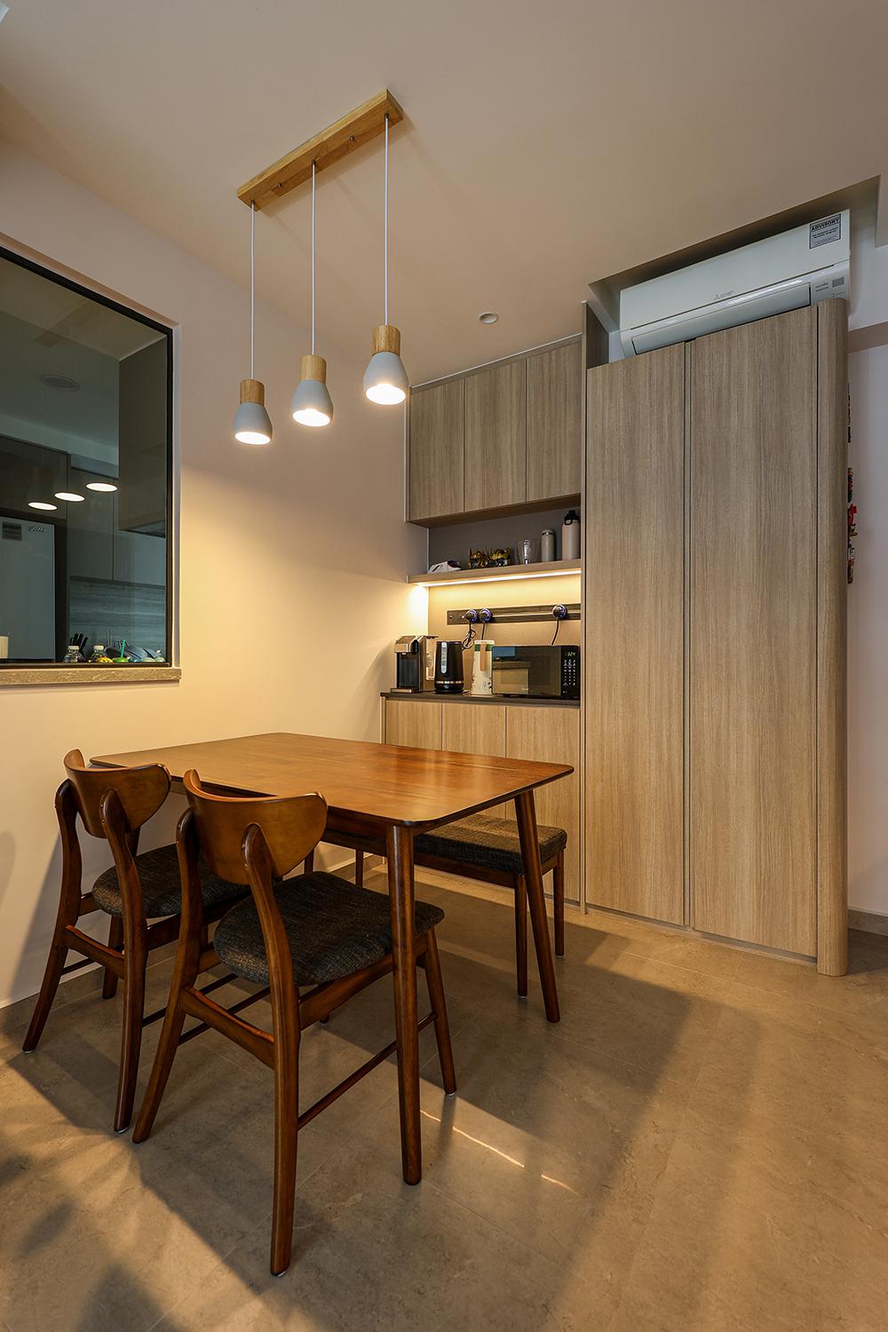 Scandinavian Dining Room with Drinkware and Storage Cabinets