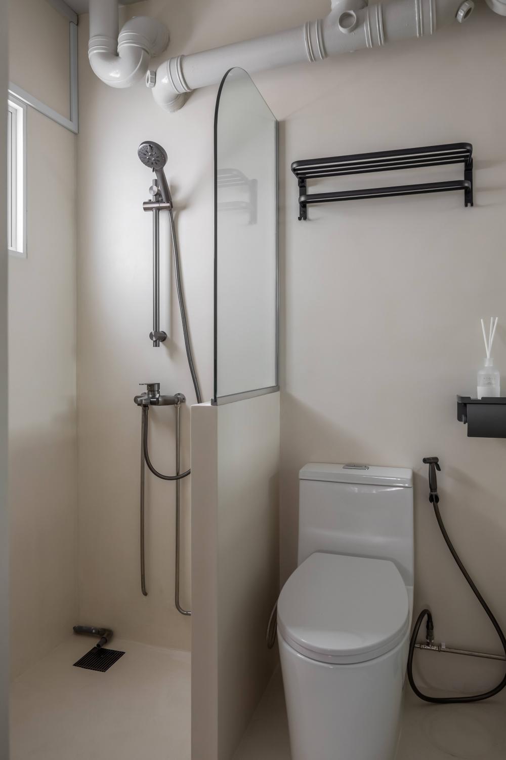 Minimalist Bathroom with Cement Floor and Shower Screen