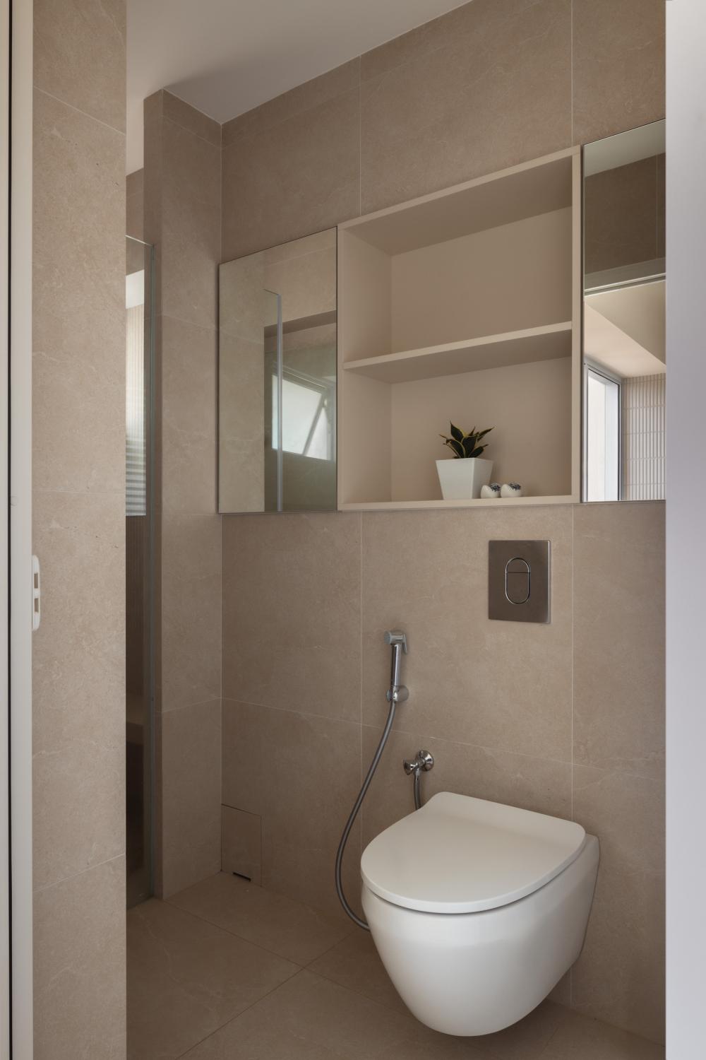 Modern Bathroom with Homogeneous Tiles and Mirror