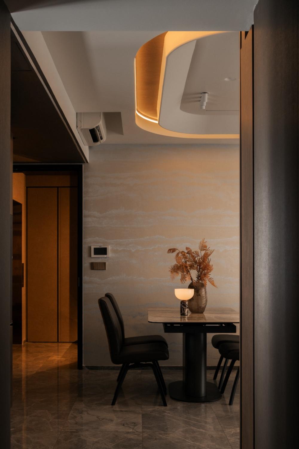 Modern Dining Room with Cove Lighting and Dining Chairs