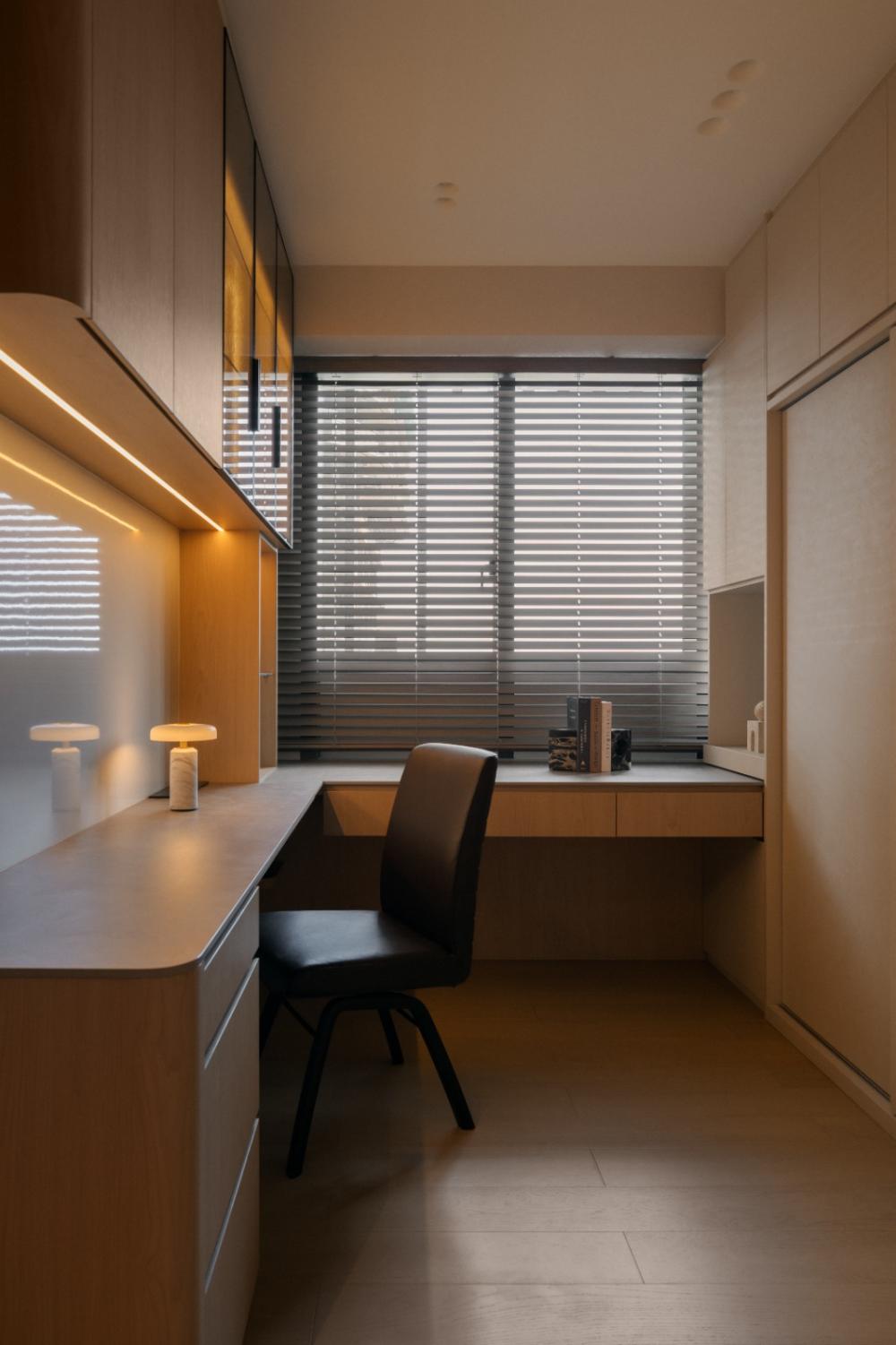 Modern Study with Bookshelf and Cove Lighting