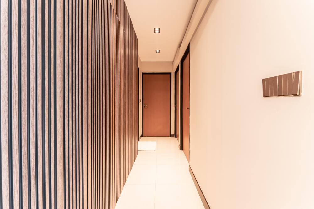 Modern Hallway with Artwork and Doors