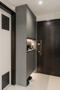 Modern Foyer at Lake Life Condominium