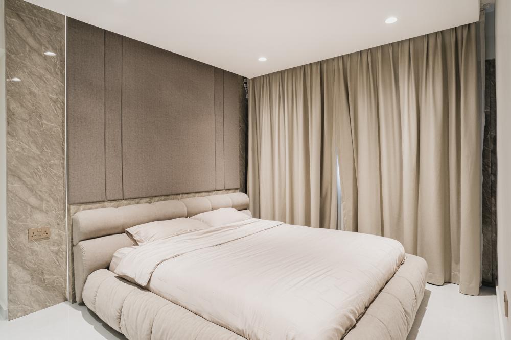 Contemporary Bedroom with Feature Wall and Drop Light