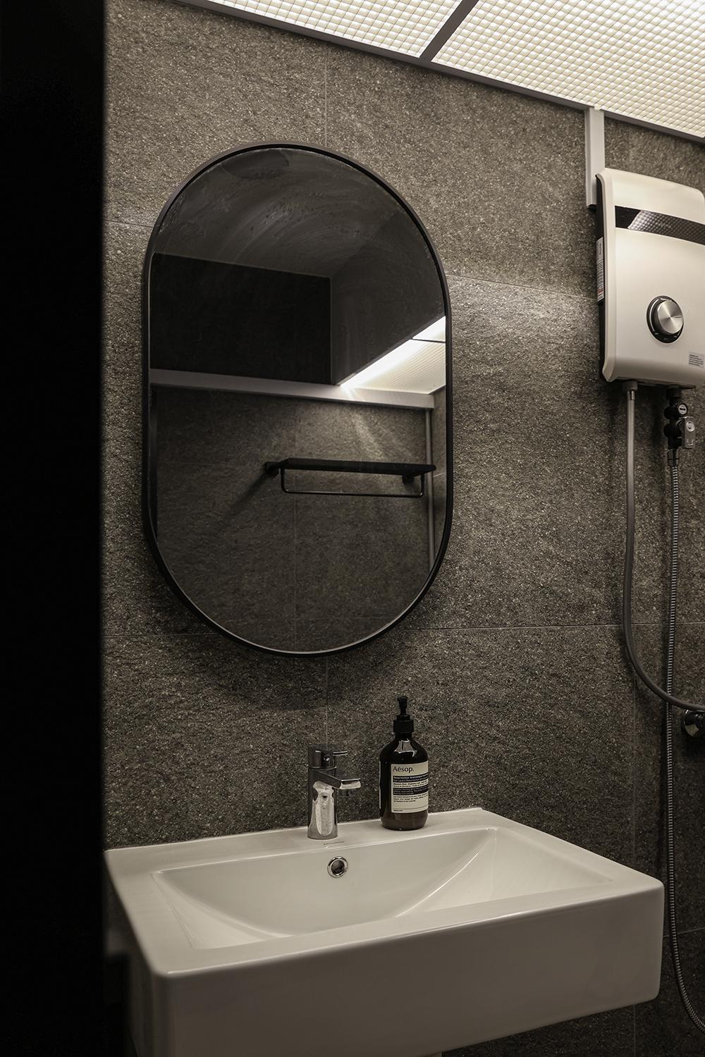 Scandinavian Bathroom with Homogeneous Tiles and Mirror