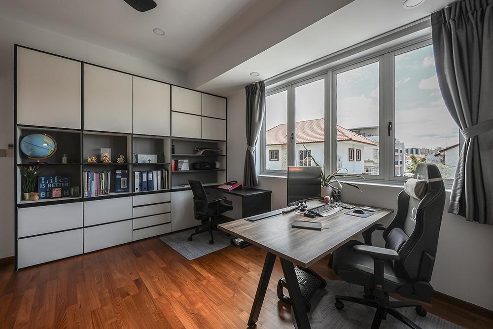Modern Home Office with Bookshelf and Desk