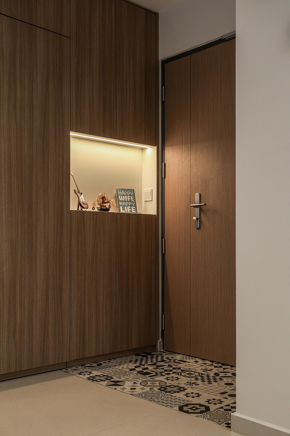 Scandinavian Foyer with Homogeneous Tiles and Storage Cabinets