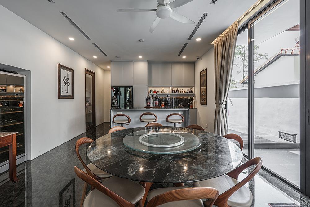 Modern Dining Room with Granite Floor and Dining Table