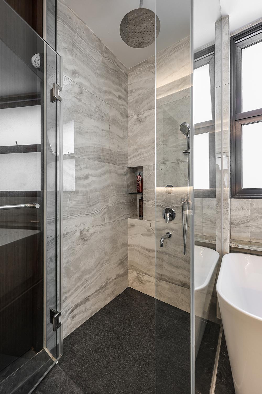 Modern Bathroom with Homogeneous Tiles and Bathtub